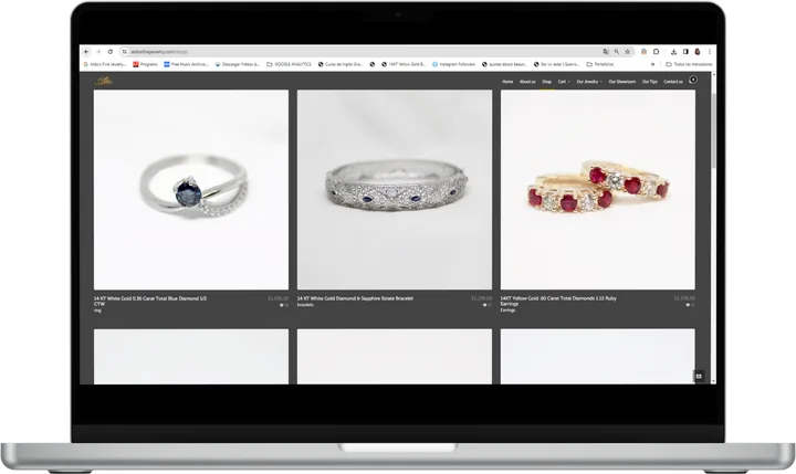 Aldo’s Fine Jewelry online store on a laptop: a grid of rings photographed on white, with names and prices.
